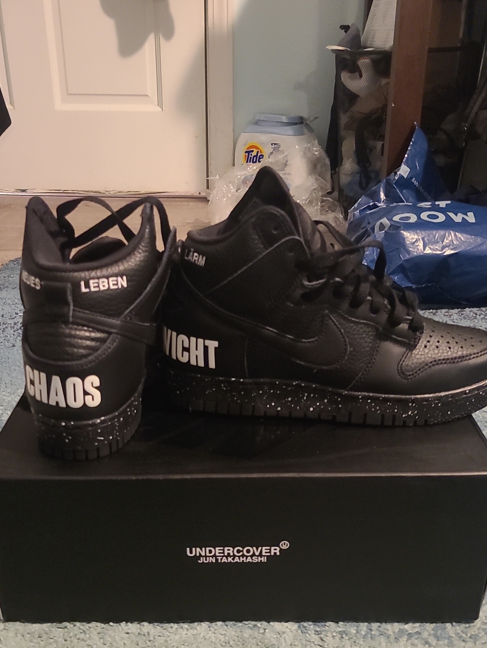 Nike Dunk Black High-Top Sneakers with White Text Accents